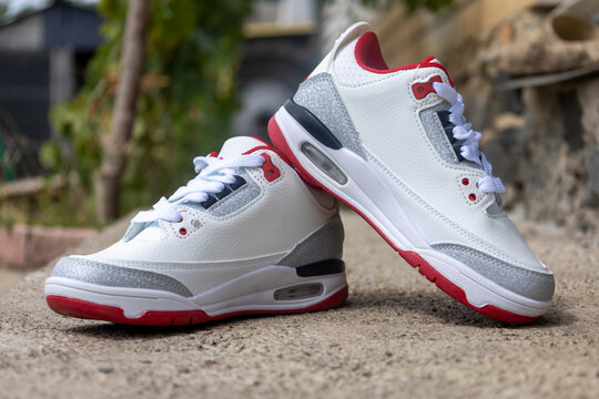 White red leather sneakers pair