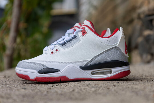 White red leather sneakers pair