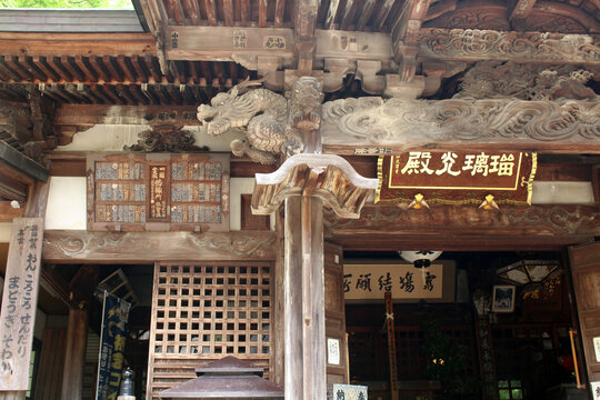 Main Hall Entrance and Wooden Dragon Carving at Okuboji Temple on Shikoku Henro Pilgrimage, Kagawa, Japan 2026