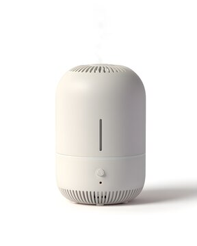 Matte white portable essential oil diffuser with subtle vent lines, wellness device isolated on white background