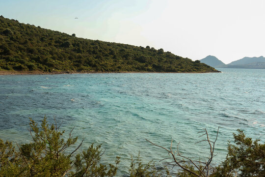 Mediterranean coastline offering tranquil sea and hills, an idyllic natural landscape for relaxing summer holidays and travel