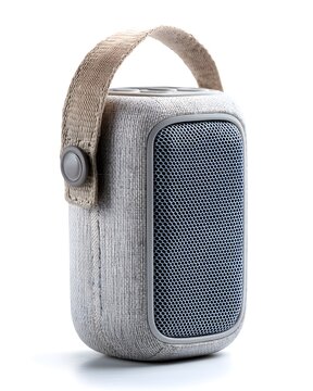 Unbranded portable Bluetooth speaker with fabric mesh body, tech product isolated on white background