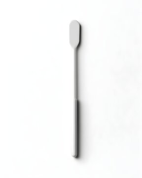 White plastic cosmetic spatula with rounded tip, skincare tool isolated on white background