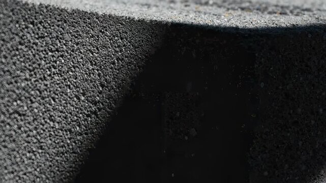 Close Up of Concrete Block Texture With Moving Shadow