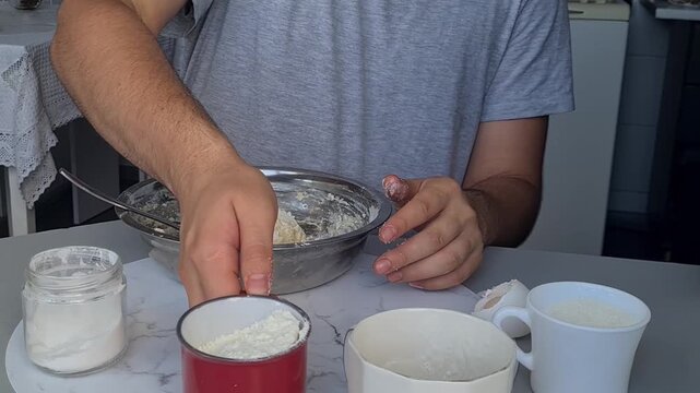 Baking bread with simple ingredients at home in the kitchen