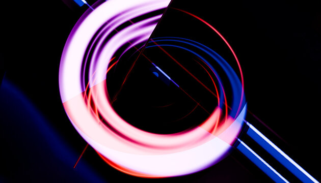 Colorful abstract circular light trails on dark background