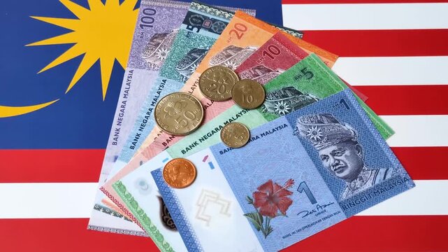 Malaysian ringgit banknotes as a tool for trade and financial transactions. The Malaysian ringgit