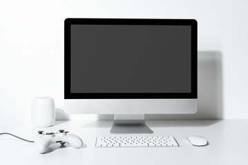 Fototapeta premium Modern workspace with gaming setup, suitable as mockup
