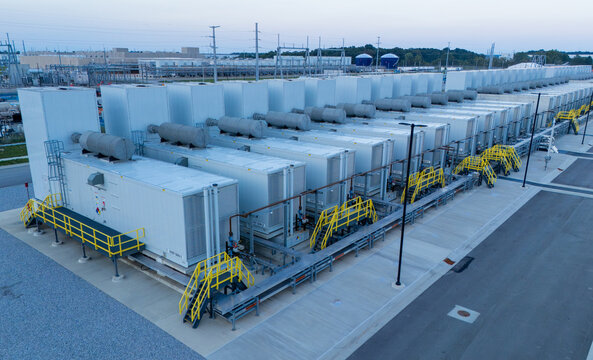 Aerial view of a large data center facility featuring rows of industrial cooling units and power infrastructure in New Albany, Ohio, United States.