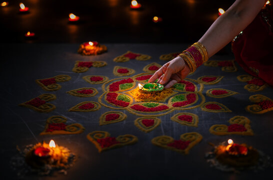 Clay diya lamps lit during diwali celebration, Diwali, or Deepavali, is India's biggest and most important holiday.