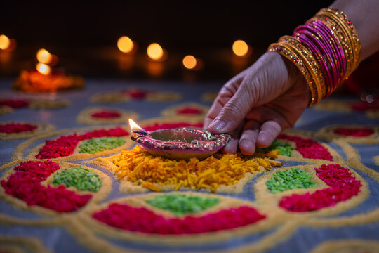 Clay diya lamps lit during diwali celebration, Diwali, or Deepavali, is India's biggest and most important holiday.