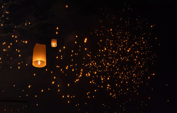 Tourist floating sky lanterns in Loy Krathong festival , Chiang Mai ,Thailand.