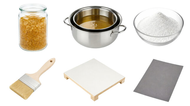 Supplies for mosaic art: tesserae, melted adhesive, grout, brush, base, abrasive paper. Isolated on white.