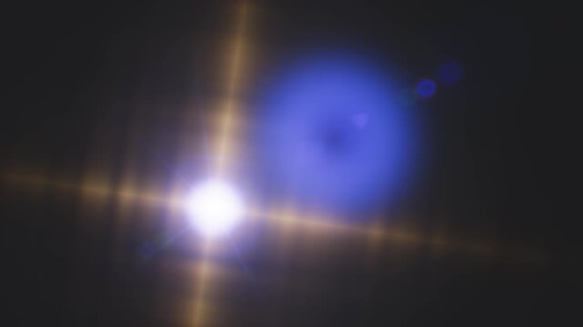 A bright lens flare effect shining across a dark digital background with glowing lights