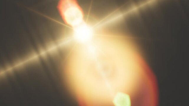 Intense lens flare effect with realistic light streaks in a digital image.