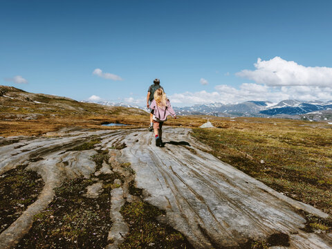 Family hiking vacation in Lahko National Park, Norway - child and father explore mountain trails together active healthy lifestyle adventure outdoor recreation