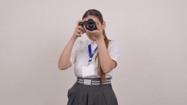 Indian Schoolgirl Clicking Picture with Mirrorless Camera