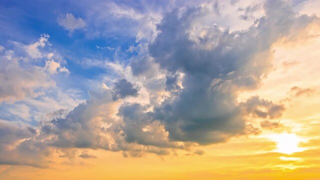 Beautiful sunset sky with dramatic clouds and vibrant yellow horizon