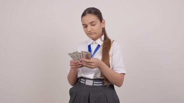 Confused Indian Schoolgirl Counting Money, Indian Rupees