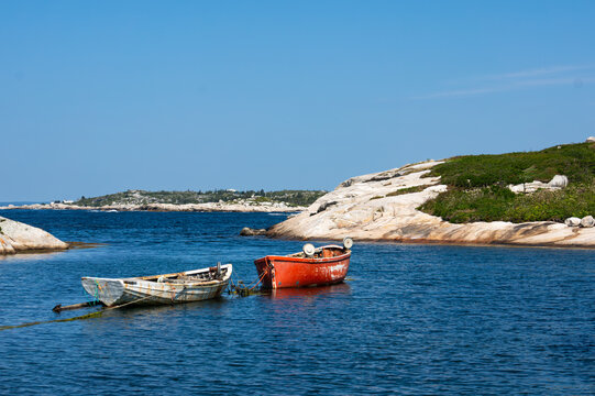 Red and White Dories Moored in Calm Cove, Peggy's Cove, Nova Scotia