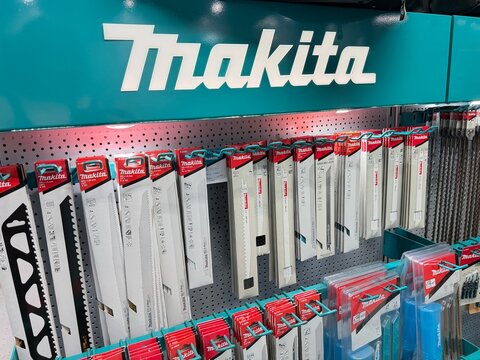 Palma, spain, august 2, 2026, makita brand logo with power tool accessories, featuring saw blades and drill bits for construction and diy