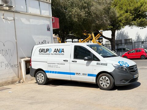 Palma, spain, august 2, 2026, white mercedes benz vito van for grupo anja company, delivering machinery parts in city street