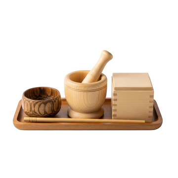 Wooden mortar and pestle with grater on bamboo tray