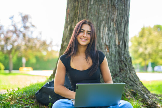 portrait of a teen student in university background