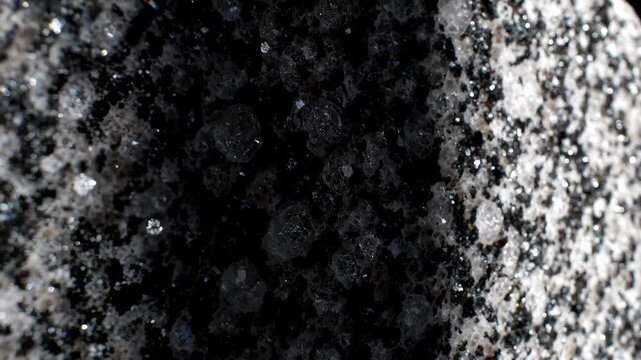 Macro Close Up of Granite Rock Surface With Moving Light and Shadow
