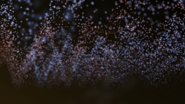 A mesmerizing slow-motion visualization of glowing particles forming and dissolving in a dark
