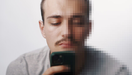 Digital Privacy Concept: Man with Pixelated Face Holding Smartphone