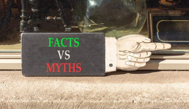 Facts vs versus myths words symbol. Concept words Facts vs Myths on beautiful black information sign. Beautiful shopfront background. Business and facts vs versus myths concept. Copy space.