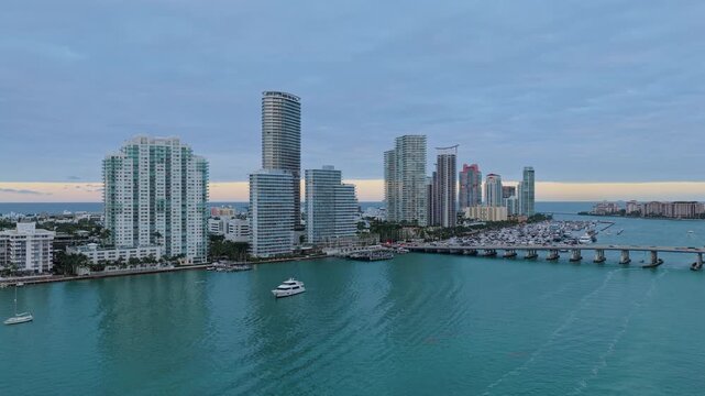 Miami south beach view. Yacht club. Marina in Miami, Florida on sunset. Scenic marina evening. Miami marina with luxury yacht. Summer sunset vacation. Luxury South beach marina. Luxury yacht