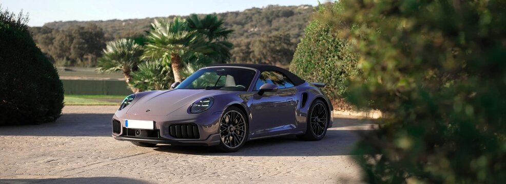 2026 Porsche 911 Turbo S Cabriolet, luxury sports car car driving on road