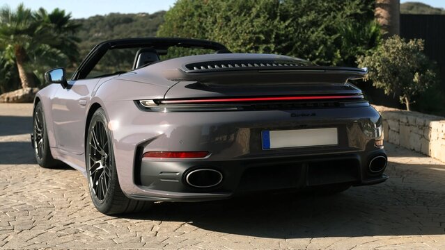 2026 Porsche 911 Turbo S Cabriolet, luxury sports car classic car on the street