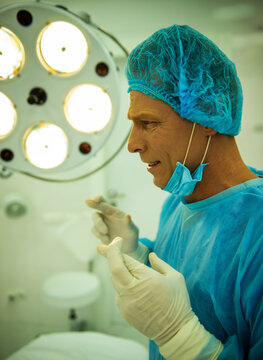 Concerned Surgeon Gesturing.