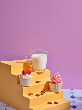 Delightful composition of milk, cupcakes, and almonds