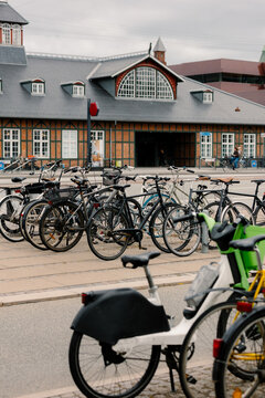 Outdoor public bicycle parking lot in front of a building in Copenhage