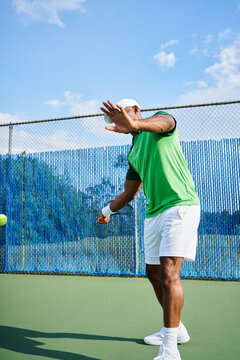 Anonymous Tennis player forehead tracking the ball