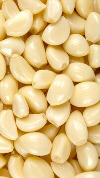 Group of Peeled Fresh Garlic Cloves Background Pattern