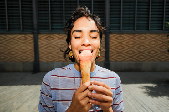 Woman enjoying refreshing ice cream 
