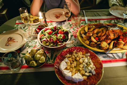 Delicious Feast Shared Among Friends During a Cozy Evening