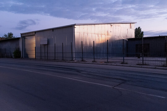 Metal Warehouse Reflecting Evening Light