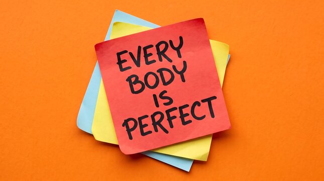Inspirational sticky note with Everybody is Perfect text, body positivity message on colorful paper, self-love concept for wellness