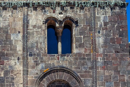 Mullioned window on facade on the Santa Maria del Regno church in Ardara. Sardinia, Italy