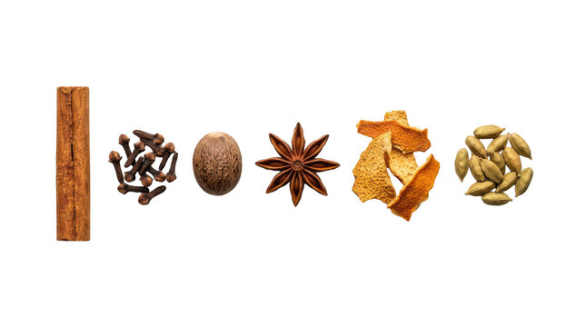 Selection of aromatic dry spices including cinnamon stick cloves nutmeg star anise bay leaf and cardamom seeds