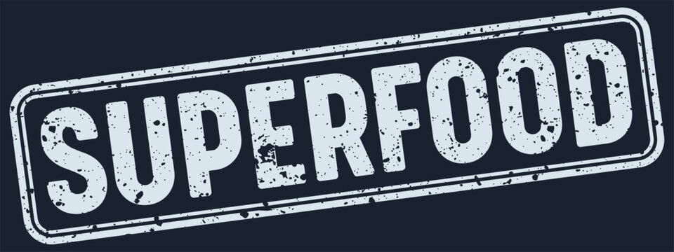 superfood white grunge stamp on dark blue background. superfood stamp