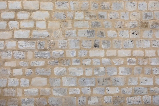 Rustic Beige and White Stone Wall Texture