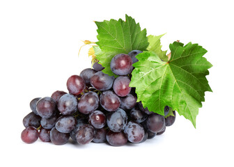 Fototapeta premium Bunch of grapes with green leaves isolated on white