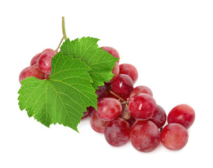 Fototapeta premium Bunch of grapes with green leaves isolated on white